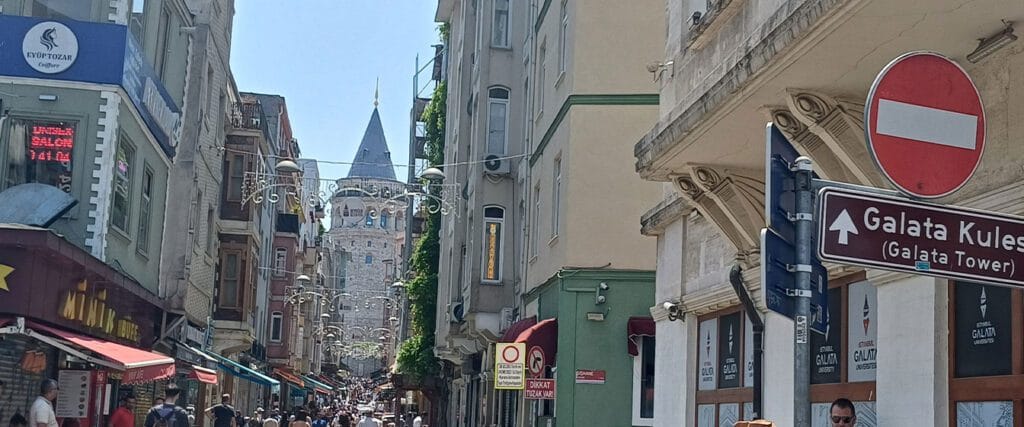 Narrow cobblestone streets leading up to Galata Tower in Istanbul
