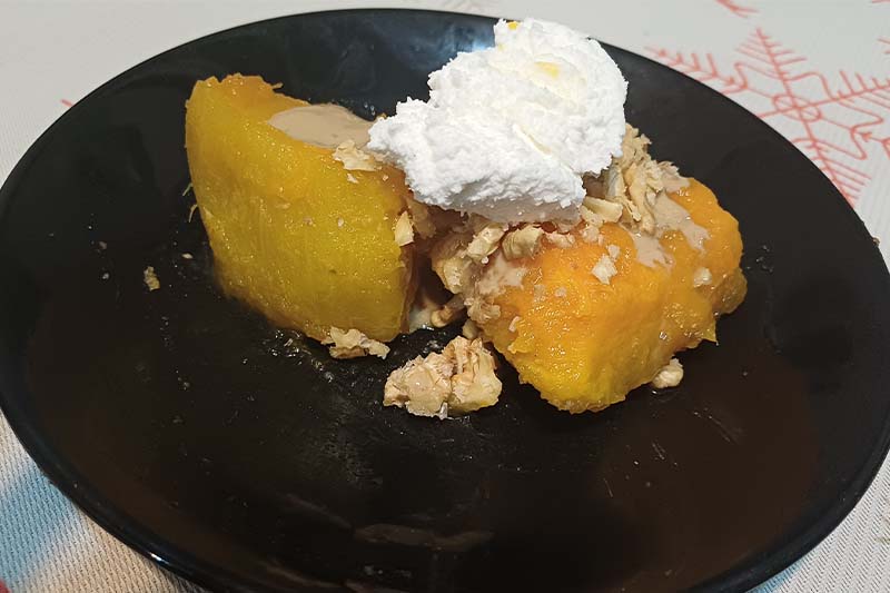 Turkish pumpkin dessert topped with nuts