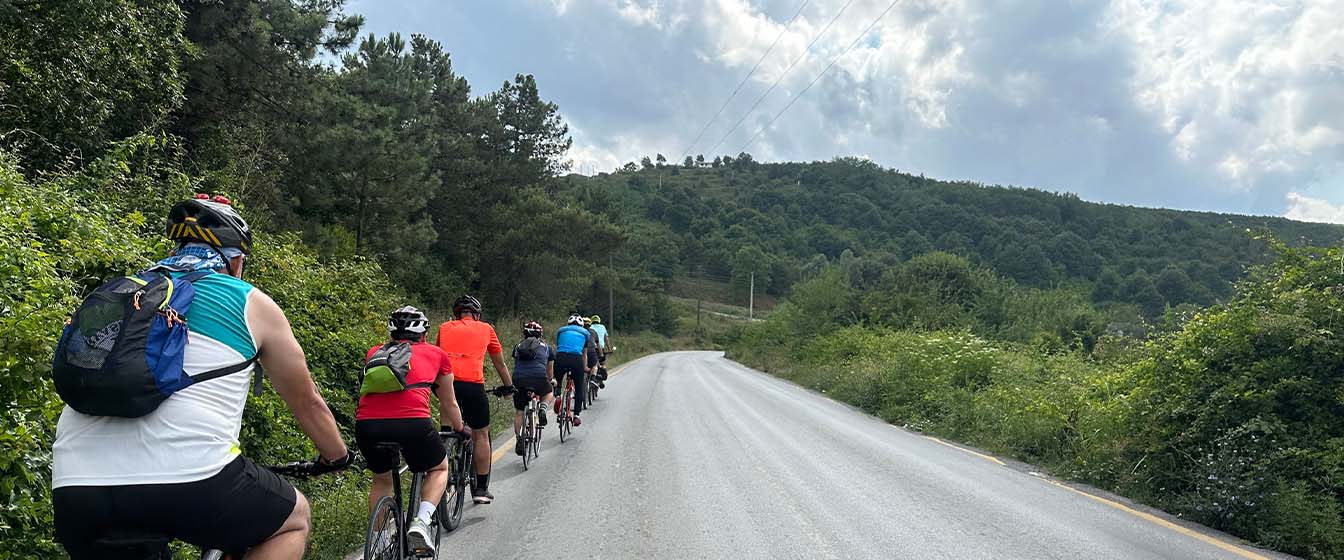 Cycling in Turkey - Cyclist riding through a forest mountain trail in Sakarya, Turkey