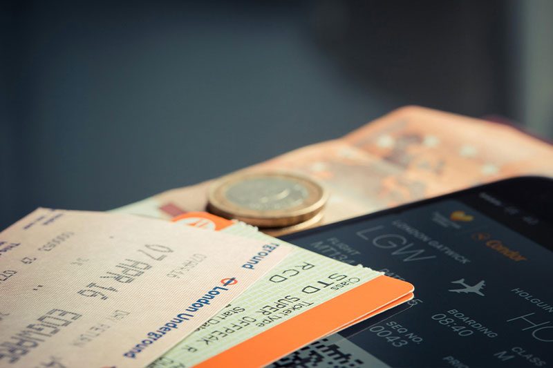 Close-up of boarding passes and a passport