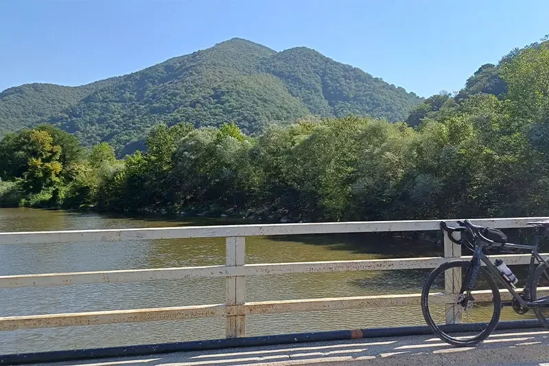 Bicycle on a bridge over a mountain river in Sakarya